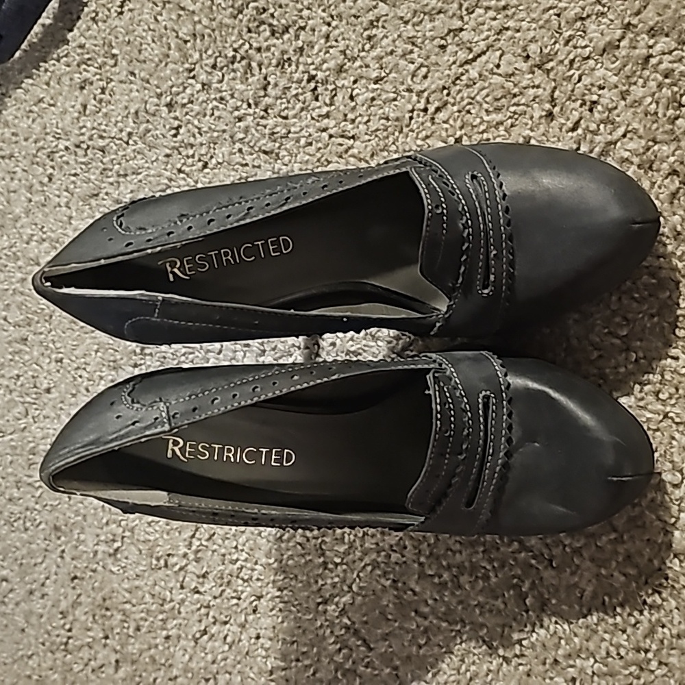Restricted Black Heels